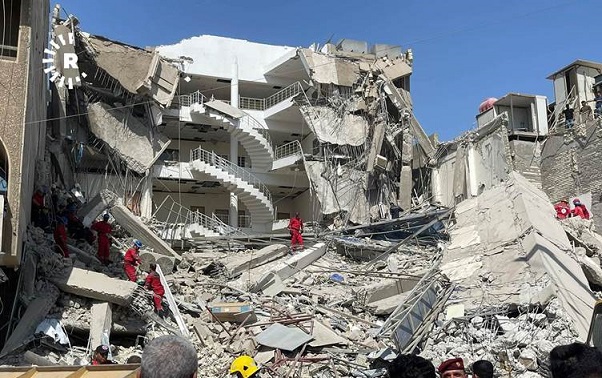 نقاذ ١٣شخصاً من تحت ركام مبنى تجاري منهار في بغداد Enheyar.3